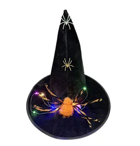 Close-up detail of the black Halloween witch hat featuring glowing spider and colorful LEDs.
