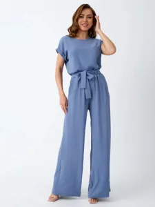 Detailed view of the elegant blue short sleeve top and wide leg pants casual two piece set.