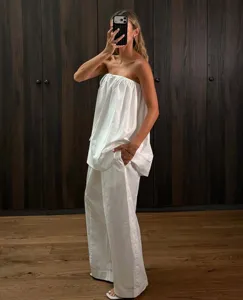 Γυναικειο λευκο strapless τοπ και φαρδυ παντελονι σετ καλοκαιρινο σικ casual look