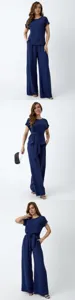 Detail view of the elegant navy blue short sleeve top and wide leg pants two piece set.