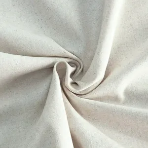 Natural beige linen fabric material detail texture closeup for custom garment and dress design.