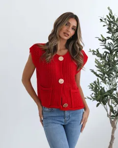 Stylish red chunky knit sleeveless cardigan vest with metal buttons and front pockets.