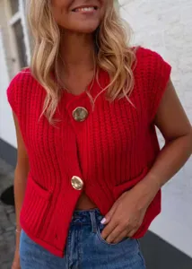 Red chunky knit sleeveless vest detail, golden button closure, casual streetwear style.