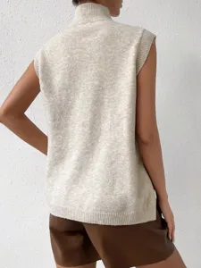 Vista posterior detalle chaleco jersey punto sin mangas cuello alto beige invierno