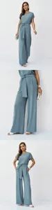 Detailed view of the elegant grey-blue women two-piece set, highlighting the loose top and pants.