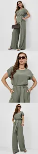 Detailed view of the elegant olive green two-piece outfit featuring a loose short-sleeve top and wide-leg pants.