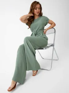 Elegant sage green two-piece set featuring a stylish short-sleeve top and wide-leg trousers.
