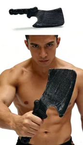 Detailed shot of a black plastic Halloween butcher cleaver prop with skull handle texture.