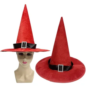 Red witch hat detail shot featuring velvet texture, black satin ribbon, and sparkling rhinestone buckle.