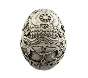 Detailed resin skull carving ornament, unique textured home and aquarium decor piece.