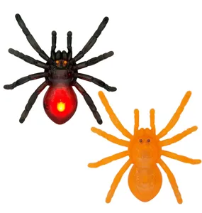 Plastic flashing LED spider toy for Halloween party pranks and spooky scary decoration details.