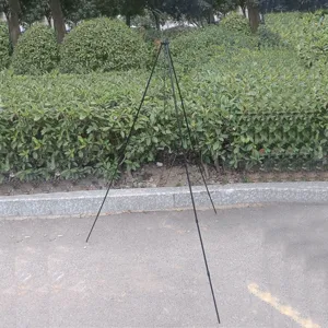 Portable outdoor camping tripod iron rack for cooking pot campfire BBQ outdoor adventure use.
