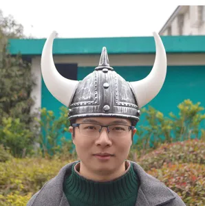 Detailed shot of the Viking horned helmet showing the distressed silver finish and large white horns.
