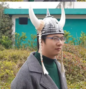 Viking horn helmet costume hat with braids for holiday party dress up and cosplay events.