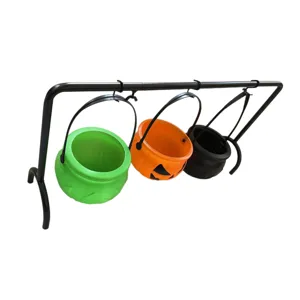 Halloween witch cauldron pumpkin bucket set with metal rack, ideal for party candy decor.