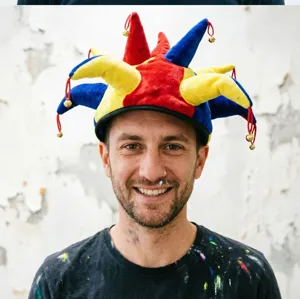 Colorful jester hat with bells, perfect for Halloween, parties, and stage performances.