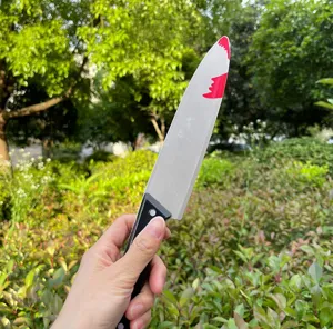 Falso cuchillo de plástico ensangrentado para fiesta de Halloween y accesorio de disfraz.
