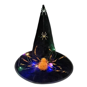 Halloween black witch hat with glowing spider and colorful string lights for party festival main