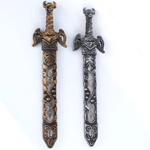 Close-up of gothic fantasy toy swords with skull pommels and detailed scabbard designs.