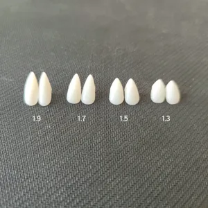 Halloween cosplay vampire teeth white resin fangs set in 4 different sizes for party.