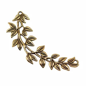 Detailed view of antique bronze branch leaf connector jewelry finding for DIY crafts.