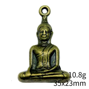 Detail view of vintage zinc alloy Buddha pendant, bronze color, size 35x23mm, weight 10.8g.