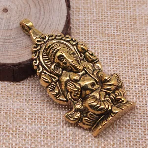 Detailed shot of antique gold Ganesha pendant zinc alloy vintage necklace jewelry accessory