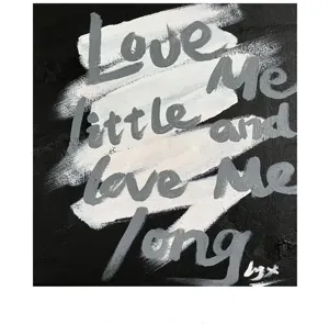 Acrylic marker detail shot showing smooth handwritten English text on canvas surface effect.