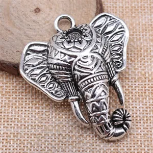 Antique silver elephant pendant DIY jewelry accessory, tribal style metal charm for necklace.