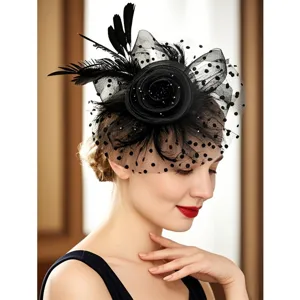 Black vintage feather fascinator headband with dotted mesh veil detail for parties.