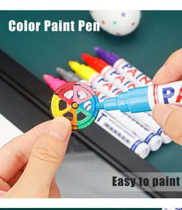 Detail view of colorful paint markers in use, perfect for DIY crafts and smooth drawing surfaces.