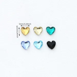 Detail view of 6mm heart crystal rhinestones, showing brilliant facets and vibrant colors.