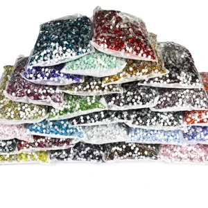 Wholesale multi-color flatback rhinestones set, assorted glass nail art crystals in bags.