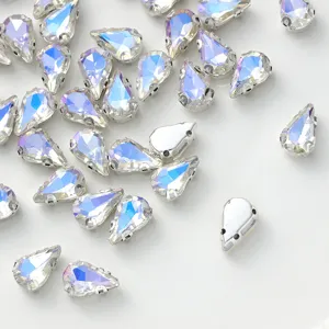 Teardrop crystal rhinestones with claw settings for DIY sewing, clothing, and phone case decor.