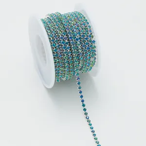 Roll of gradient rhinestone claw chain for diy nail art jewelry crafting and decoration.