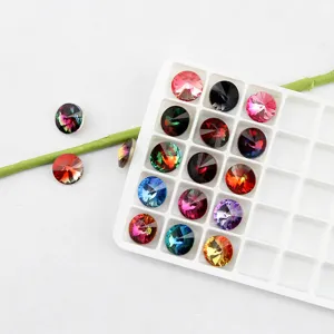 Detail view of 10mm round pointed-back gradient crystal rhinestones for nail art and DIY decor.