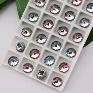 Detailed close-up view of 10mm round pointed-back gradient crystal rhinestones for DIY crafts.