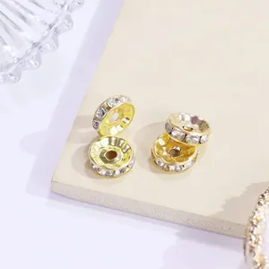 Goldene Strass-Abstandshalter Perlen für DIY Armbänder, Metall Rad Charms Schmuck Details.