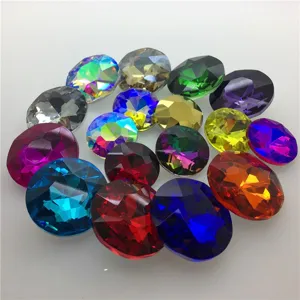 Colorful oval glass crystal rhinestones for DIY bridal hair accessories and clothing crafts.