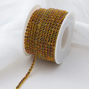 Detail view of gradient AB glass rhinestone claw chain on spool for DIY crafts and accessories.