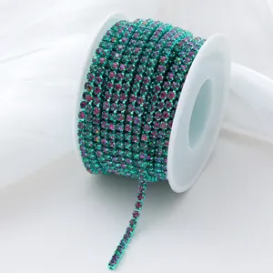 Close-up detail of gradient rhinestone claw chain, sparkling glass crystal trim for DIY crafts.