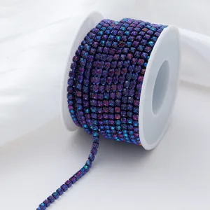 Close-up detail of gradient AB rhinestone claw chain, dense design for DIY accessory.