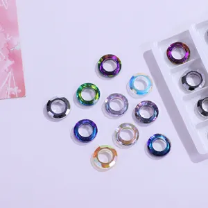 Iridescent angel ring nail art rhinestones, glass charms for DIY jewelry and clothing items.