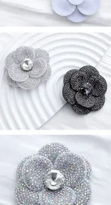 Exquisite rhinestone camellia flower accessories, crystal details and elegant sparkling design.