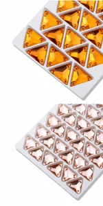 Vista dettagliata di strass triangolari da cucire, gemme in vetro piatto per creazioni fai da te.