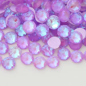 Purple flatback crystal rhinestones close up for nail art and phone case DIY decoration.