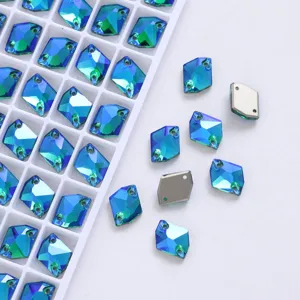 Close-up view of diamond shaped blue green AB crystal rhinestones with dual sew-on holes.
