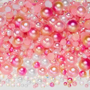 Mixed pink and white flatback pearls and AB rhinestones for DIY nail art crafts accessories.