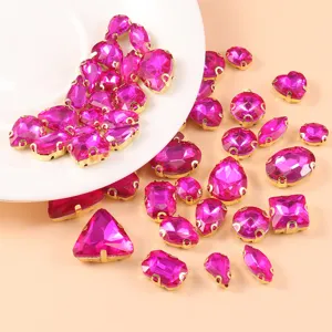 Mixed shape crystal glass rhinestones with gold claw settings for handmade DIY sewing dress crafts.