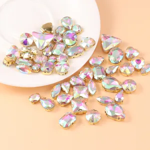 Multi-color mixed crystal glass rhinestones with gold settings for DIY sewing and crafts.